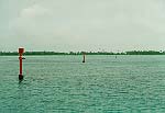 Channel markers on eastern lagoon of Bora Bora (John Beck).